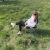 Woman relaxing in Trizand camping chair outdoors