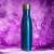 KARRY VESSEL 500ml stainless steel insulated water bottle, blue, with purple water splash background