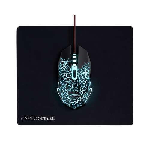 Trust 24752 gaming mouse with blue LED lighting on a black mousepad