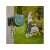 Gardena PowerRoll XXL 18645-20 automatic hose reel in use, watering flowers in a garden