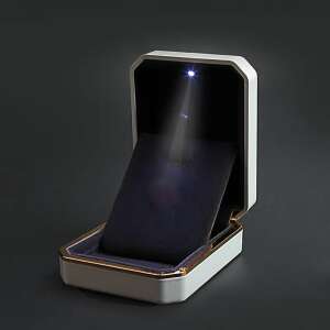 White LED jewelry box with gold trim, open with light shining on blue velvet interior - Jewelry Box