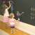 Two children drawing on a black chalkboard sticker