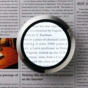 Magnifying glass with LED light, showing text through the lens, 5x magnification, portable, aluminum - Magnifying glass