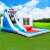 Pepita Shark XL inflatable bounce house with slide and pool, kids playing