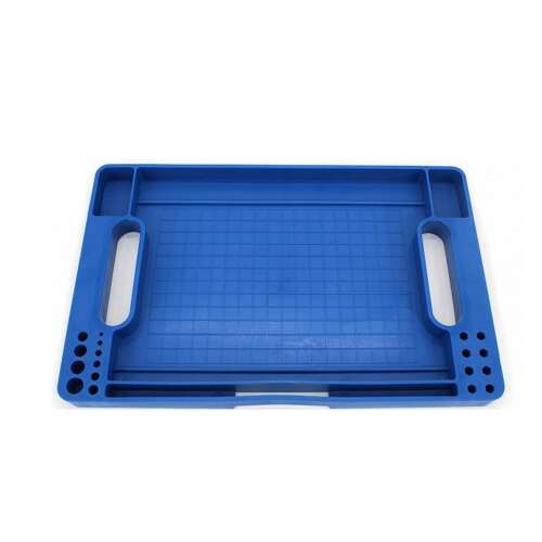 Blue silicone tool tray with compartments and holes for organizing tools