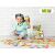 Child playing with MELI building blocks, creative construction toy