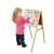 Child using a double-sided magnetic chalkboard with letters, chalk, and marker