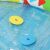 Close-up of Bestway 52378 baby pool with floating shape sorter pieces.
