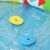 Close-up of Bestway 52378 baby pool with floating shape sorter pieces.