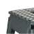 Close-up of the non-slip surface of dark gray foldable step stool