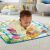 Baby playing with mirror on Fisher Price Dive Right In Activity Mat