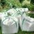 Springos 1000L Garden Waste Bags in outdoor setting