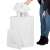 Woman putting laundry in white bamboo laundry hamper, Springos