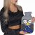 Woman holding Springos owl hot water bottle
