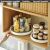 Multifunctional rotating organizers in a kitchen cabinet