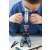 Child using the BUKI Microscope 30 Experiments STEM Toy to examine a sample