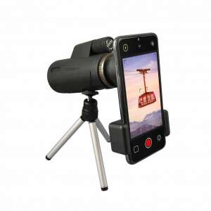 BUKI Monocular Expert Travel Telescope with smartphone adapter and tripod, taking a picture of a cable car - Buki France Science & Discovery Toy