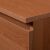 Close-up of Akord Egerfa 3-drawer Komód dresser, showing wood grain and drawer edge detail