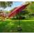 Akord ORIENT Red Patio Umbrella in garden setting