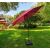 Akord ORIENT Red Patio Umbrella in garden setting