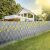 Gardlov gray privacy fence screen tape installed on fence