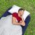 Man sleeping on Bestway air mattress outdoors