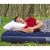 Man sleeping on Bestway inflatable camping mattress in nature