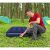 Man inflating Bestway inflatable camping mattress outdoors