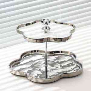 TRENDY’S two-tier flower-shaped fruit tray with satin finish, stainless steel stand, ceramic trays - Food storage