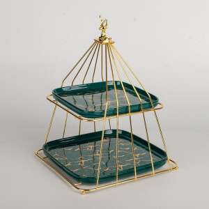 Green and gold two-tiered fruit serving tray with deer figurine on top - Food storage
