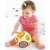 Baby playing with HolaToys Catch-Me Activity Ball, interactive baby toy with lights and sounds, colorful design with animal characters, 6 months+
