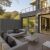 Springos retractable privacy screen on a modern patio