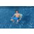 Man relaxing on Bestway H2OGO! Comfort Plush floating hammock in pool