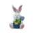 Iepuraș de Paște din ceramică care ține un ghiocel, perfect pentru a adăuga o notă de primăvară casei tale