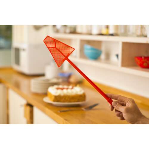 Red plastic fly swatter, 45.5cm long, effective for swatting flies and other insects