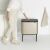 Femeie deschide coșul de gunoi Brabantia Bo Touch - Auriu - 3x11L