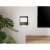 Equip 650896 Media Player Holder mounted on wall, with TV