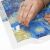 Close-up of hand applying diamonds to 5D Diamond Painting Kit Alee in the Park canvas detail
