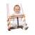 Baby enjoying a wooden swing with red ropes and safety harness