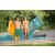 Couple with Bestway inflatable pool mattresses near a pool