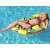Woman relaxing on the Bestway inflatable pool float, lemon design