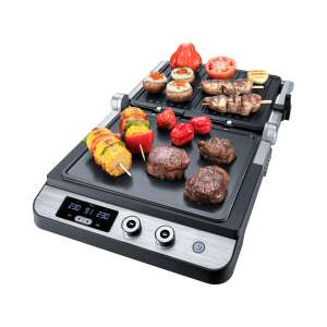 Steba Germany electric grill with various food items being grilled, including vegetables, meat, and fish - Steba