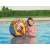Woman playing with Bestway 36 inch inflatable beach ball with colorful ice cream design in a swimming pool