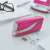LEITZ Wow No.10 electric stapler, pink, 10 sheets capacity, on desk with staples