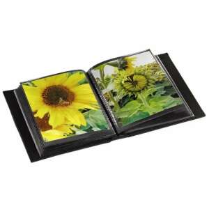 Hama "New York City" photo album open, showing two photos of sunflowers - Hama
