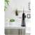 Berdsen BD-201 cordless oral irrigator, black, in bathroom setting