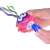 Pink diving hermit crab bath toy with goggles, showing how to open the battery compartment