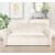 Beige velvet sofa cover in living room setting