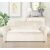 Beige velvet sofa cover in living room setting
