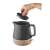 Concept RK0062 1200W electric kettle with ceramic and wood design, black and wood color, showing the lid being opened